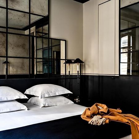 Monsieur George Hotel & Spa - Champs-Elysees Paris Exterior photo A room at the Hotel 57