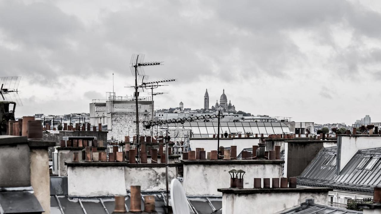 Monsieur George Hotel & Spa - Champs-Elysees Paris Exterior photo View of Paris rooftops